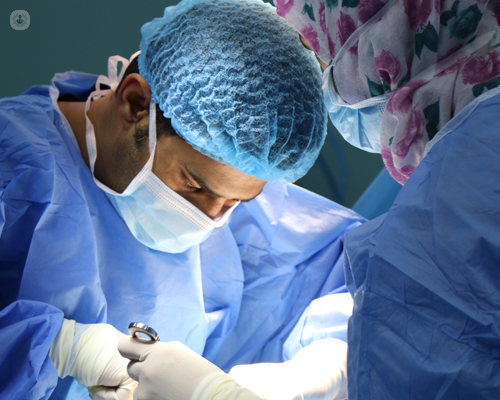 Two surgeons working in an operating theatre