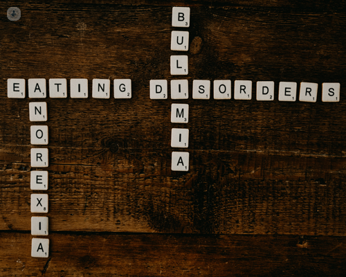 Scrabble pieces spelling out bulimia, eating disorders and anorexia