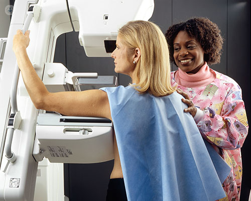 Woman having a mammography