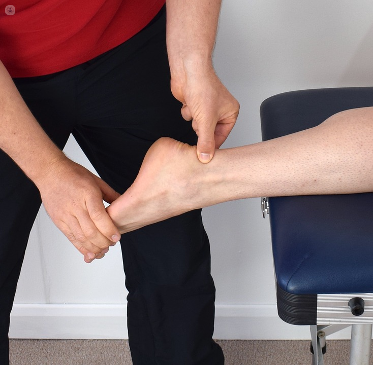 Physiotherapist treating the Achilles tendon