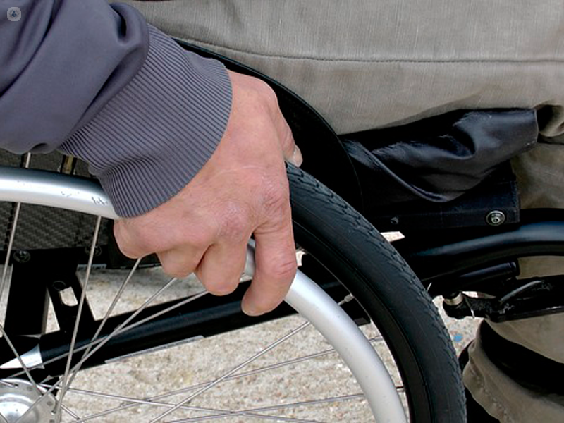 Person with a disability, sat in a wheelchair