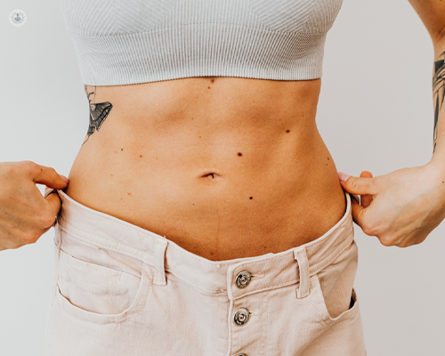 Close up of a woman who's had a tummy tuck