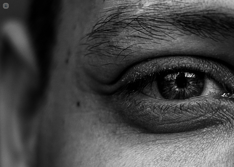 Black and white photo of a man's eye