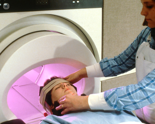 Woman about to have a brain MRI scan