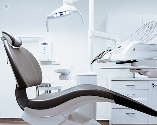 A dentist chair for patients to sit in, quite similar to one a patient at Dental Confidence would find.