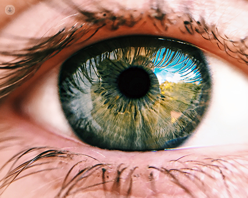 A close of up a greenish blue eye