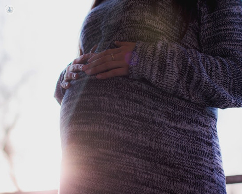 Woman experiencing an autoimmune disease during pregnancy