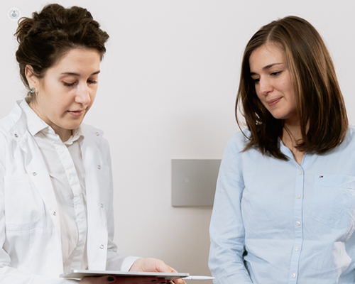 Woman discussing breast reconstruction surgery with her consultant