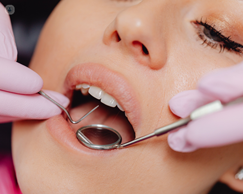woman_being_examined_before_having_dental_crown_treatment