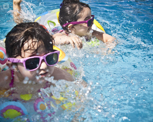 Young girls swimming - children are a risk group for meningitis