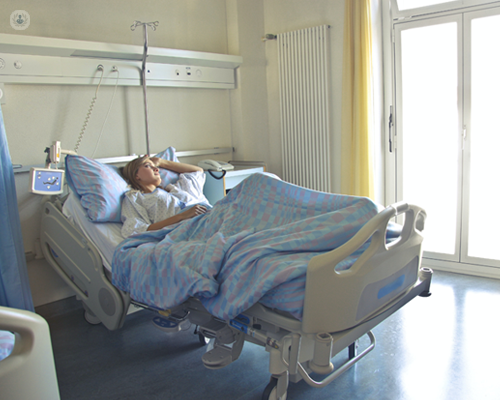 Woman with cirrhosis in hospital bed
