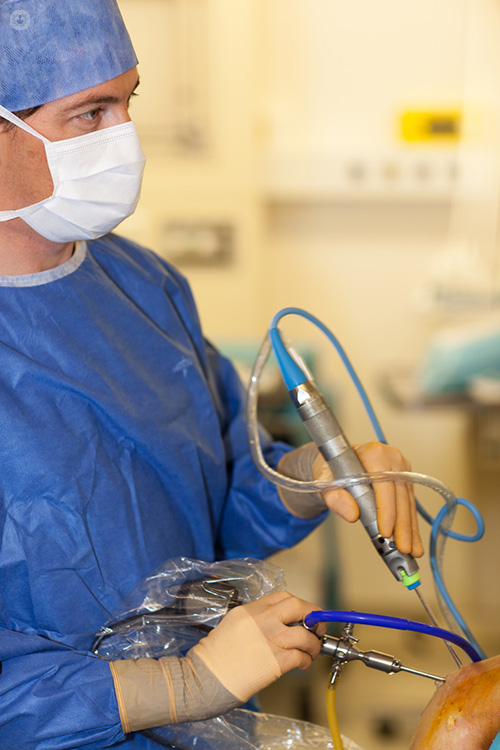 Mr Roger van Riet performing elbow arthroscopy surgery on a patient